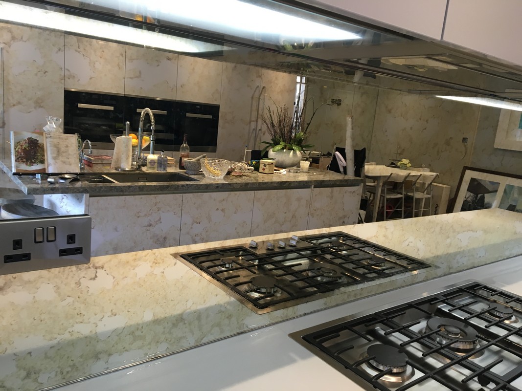 Mirror glass splashback in Tufnell Park luxury kitchen